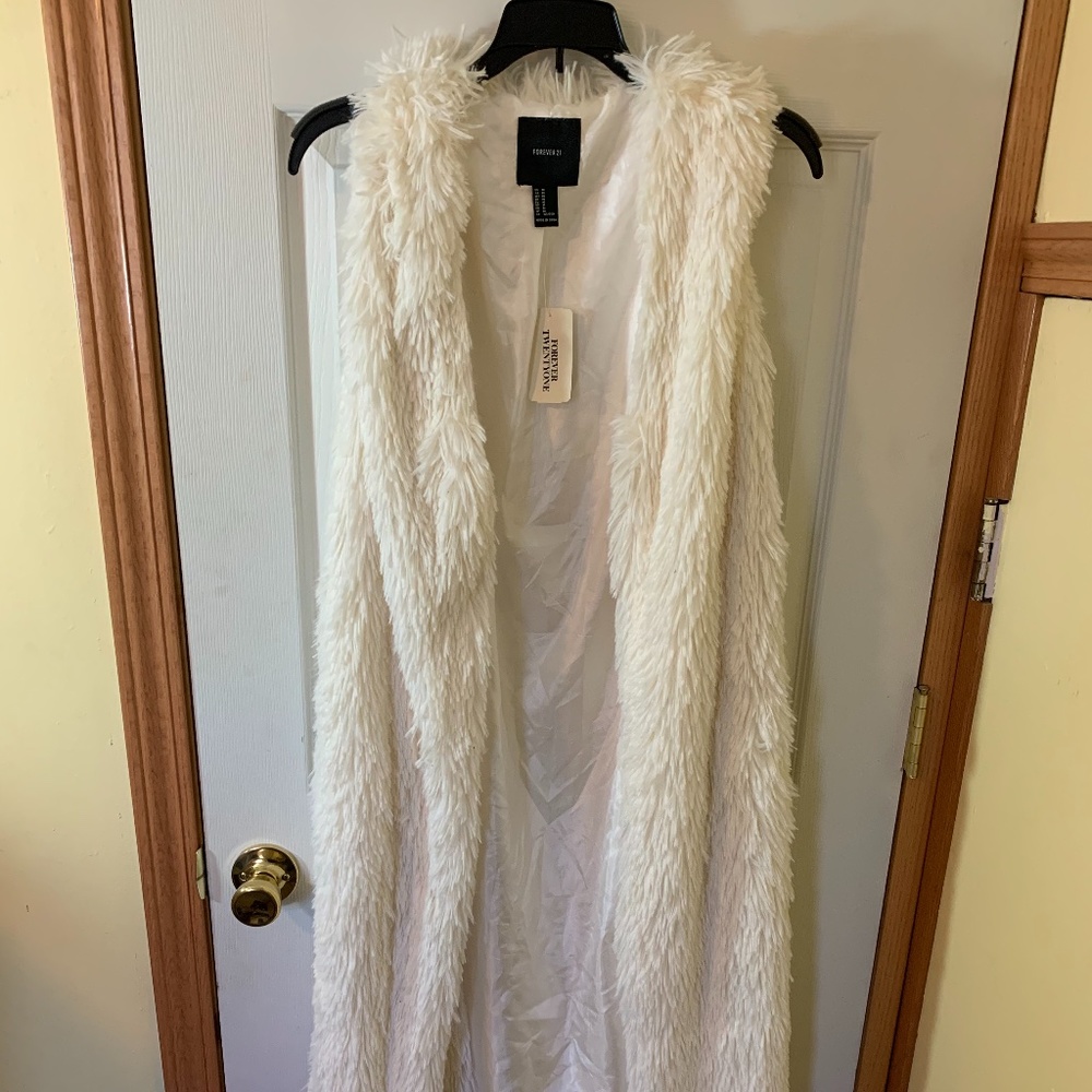 Never worn white faux fur vest
